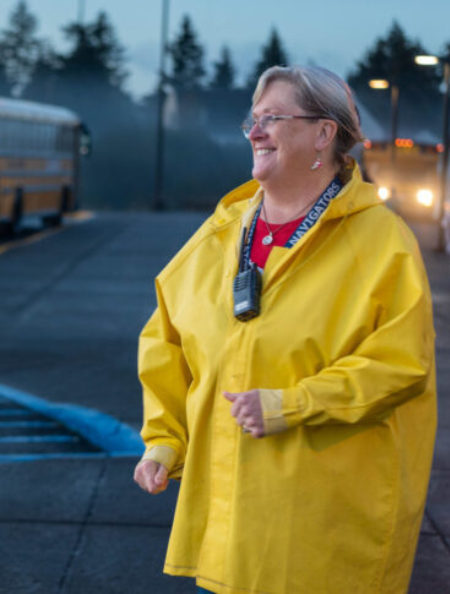 Julia Walker smiles in front of a crosswalk