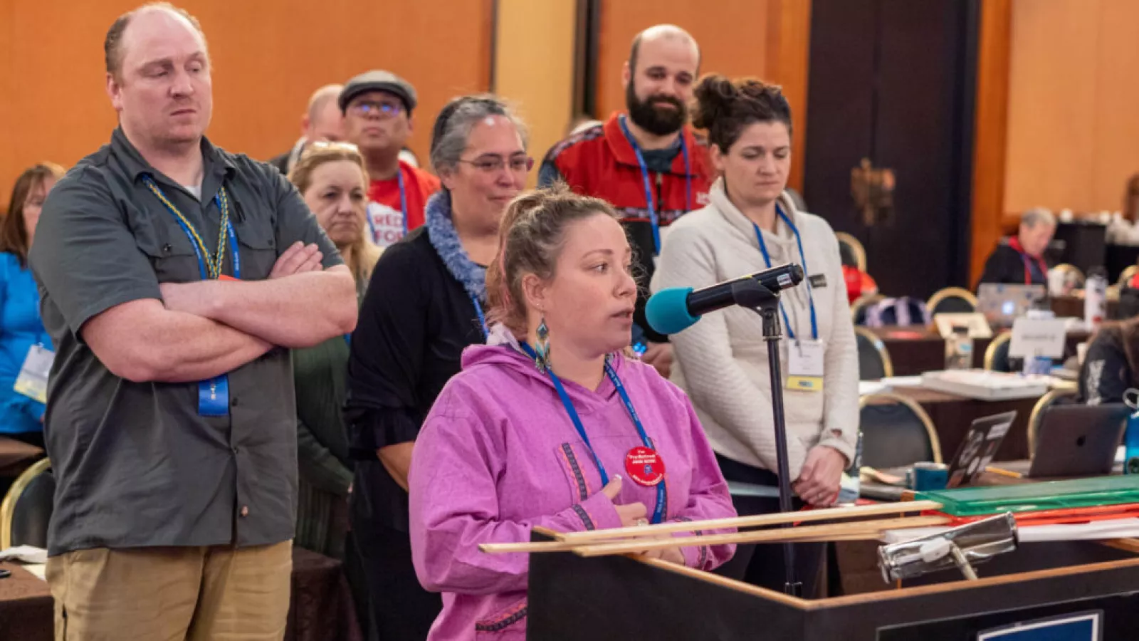 A member at the microphone debating policy at NEA-Alaska's Delegate Assembly.