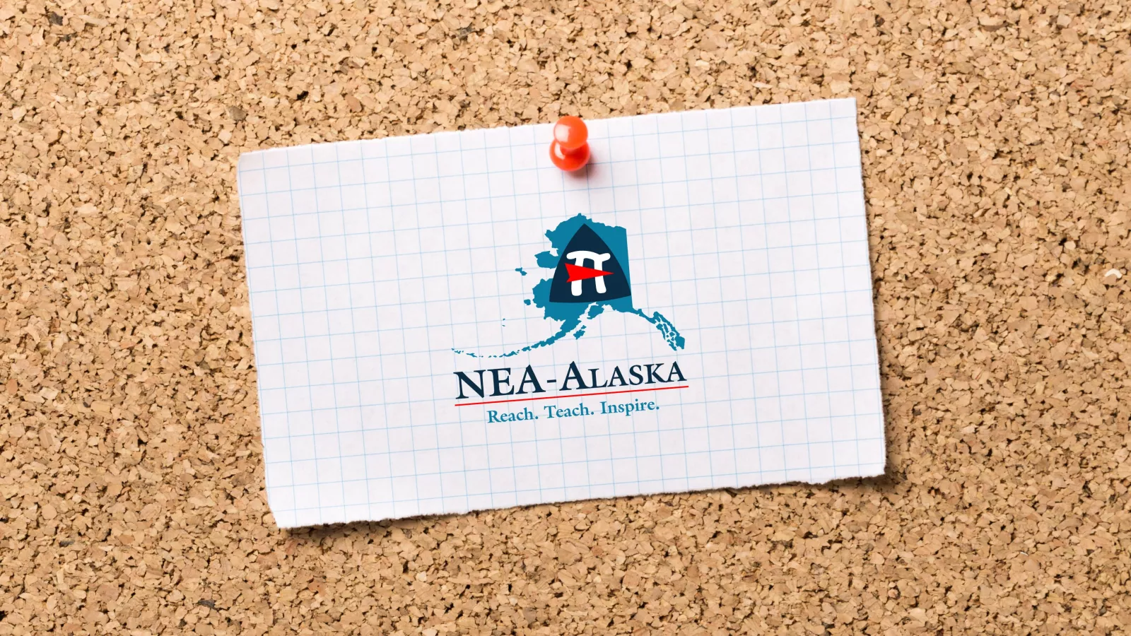 Bulletin board with NEA-Alaska logo pinned to it