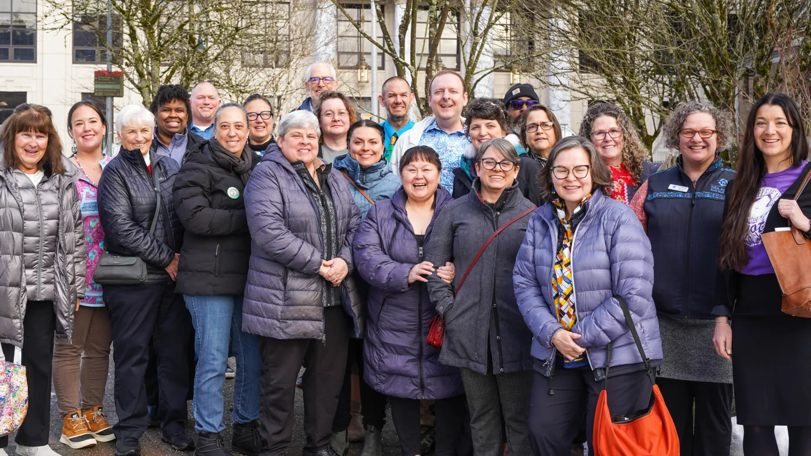 The NEA-Alaska Board of Directors poses in front of the Capitol building in downtown Juneau, Alaska.