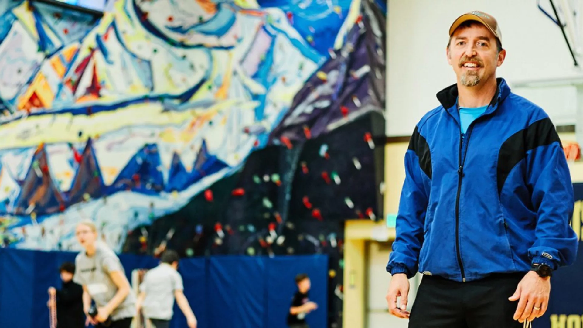 A retired member in a school gym.