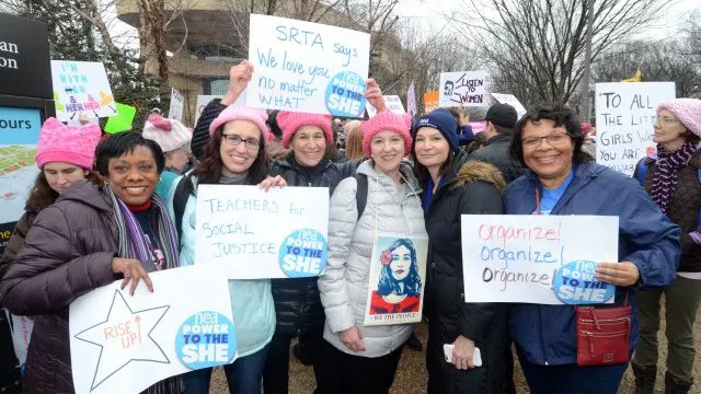NEA President and Vice-President at a rally for gender equality