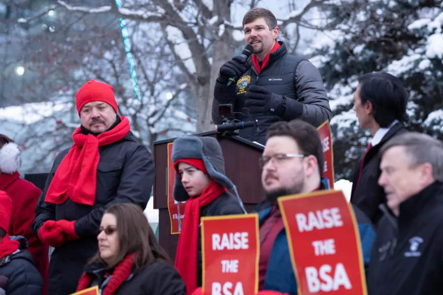 Jesse Bjorkman, educator and legislator, speaks at a rally about raising the BSA funding.
