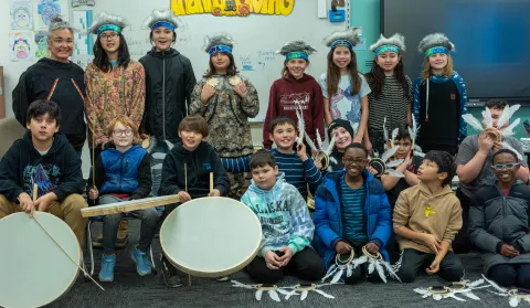 Yvette Cross's 5th Grade Class Posing in Native Dance Regalia